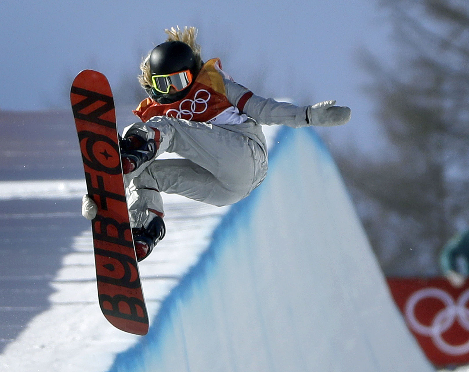 Chloe Kim jumps during the women's halfpipe finals